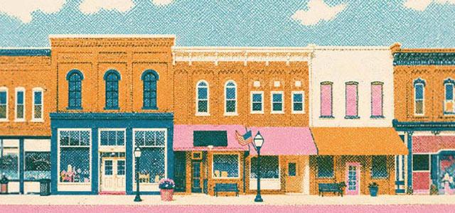 a row of brick building store fronts
